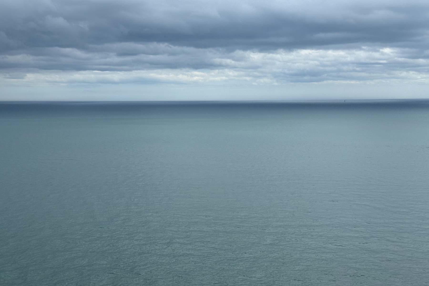 An expansive steel blue ocean in Howth, Ireland